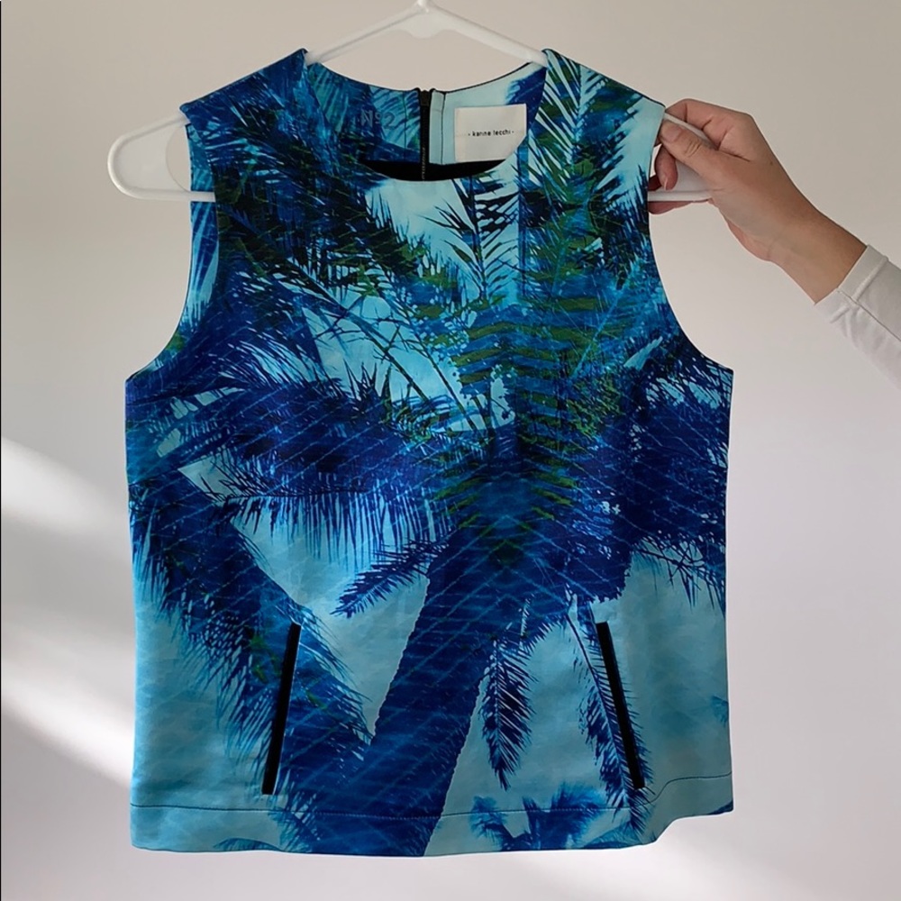 Karine lecchi blue patterned top size 4